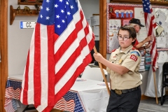 Logan-Clark-presents-flag